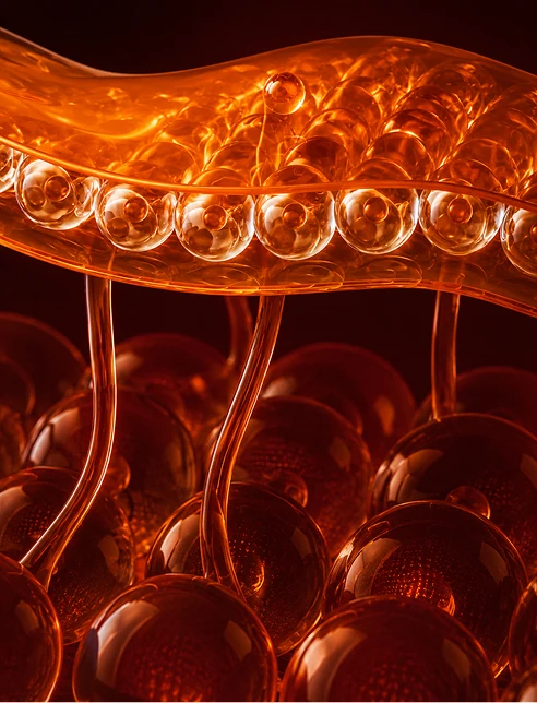 An abstract amber surface with fine strands beneath it.